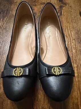 Cole Haan Black Leather Ballet Flats with Gold Logo Trim
